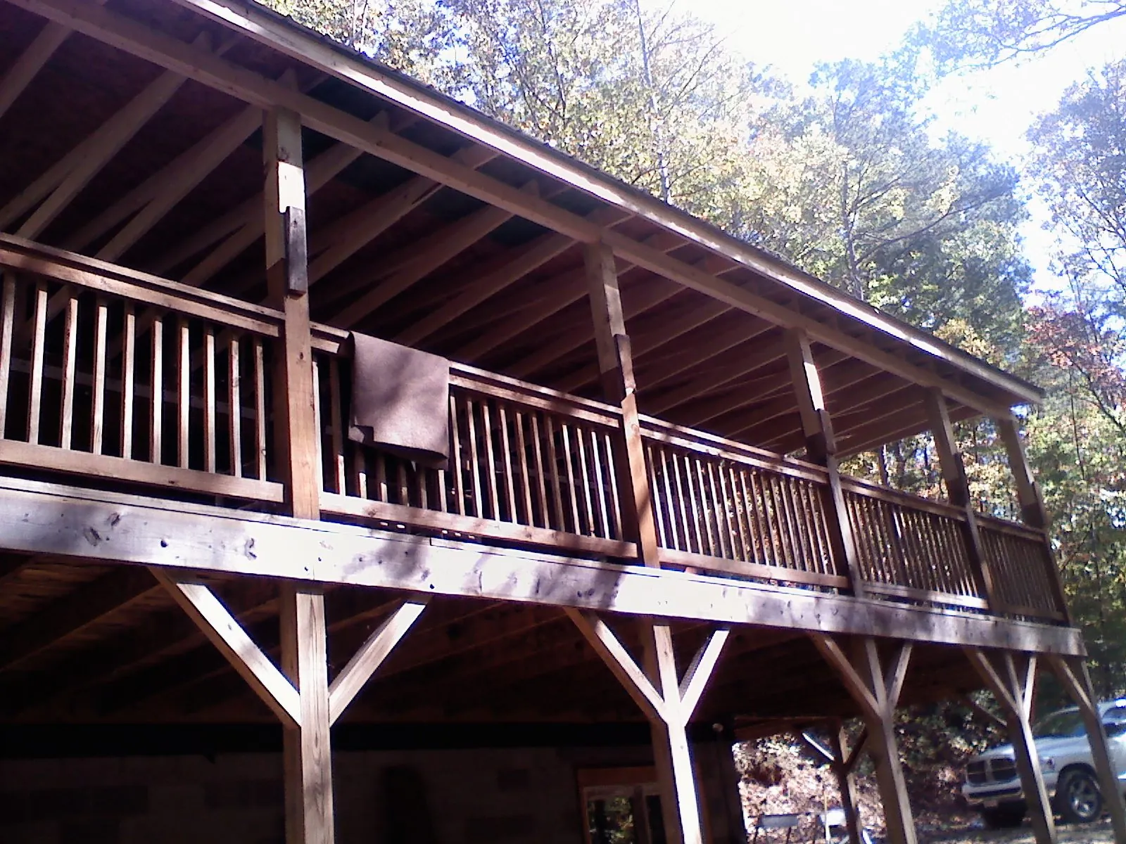 Timber framing under a new elevated porch and deck — Roof Leak Repair in Hermiston by Roofing Brothers